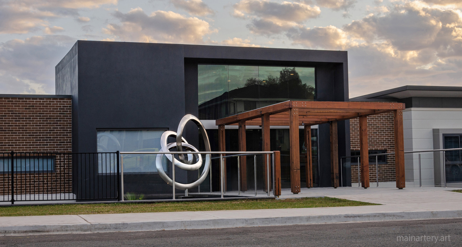 building entrance stainless abstract public artwork image