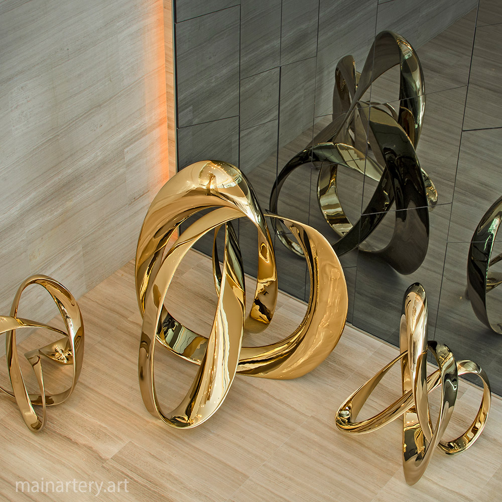 Cover: Titanium and Gold Sculpture