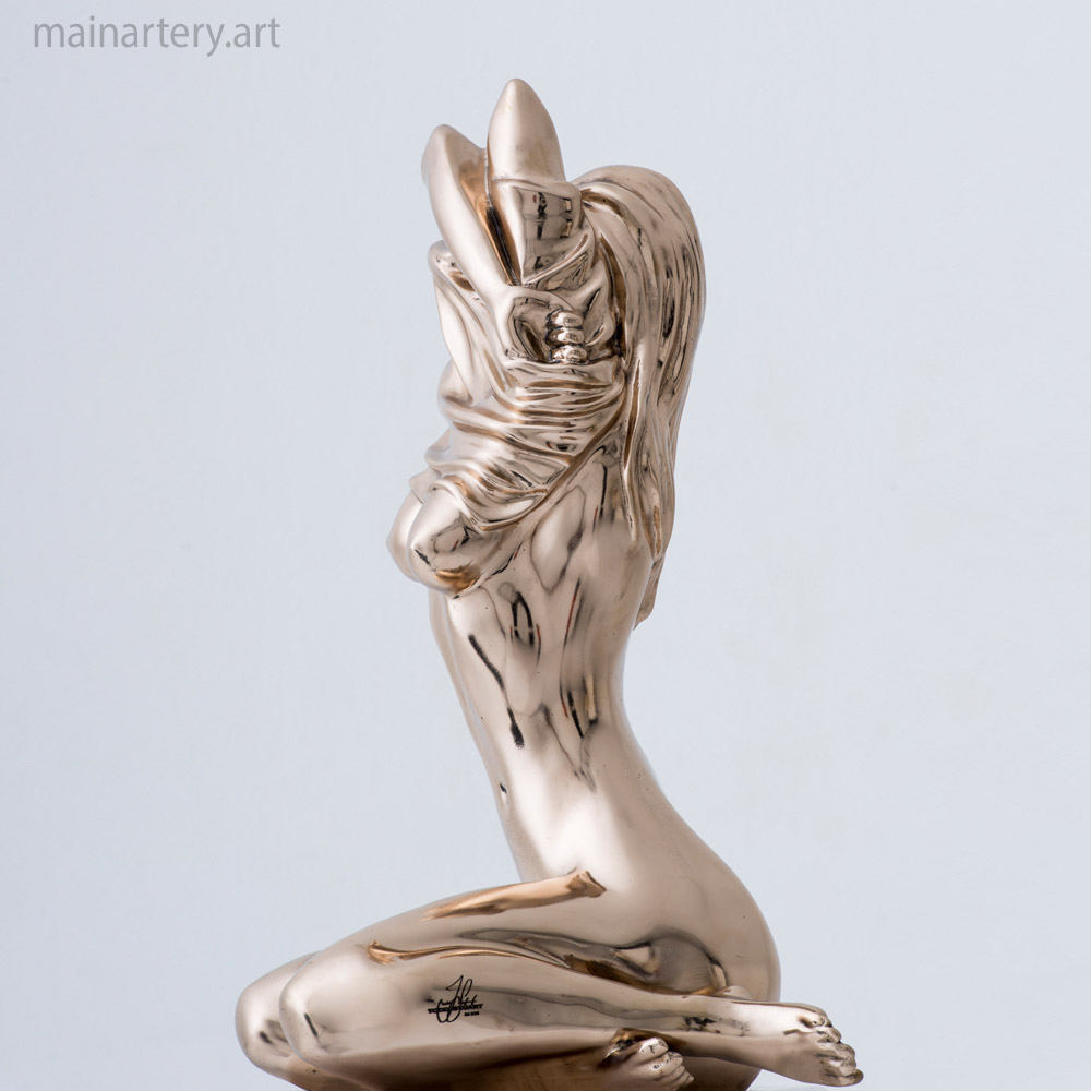 Cover: Female Golden Sculpture
