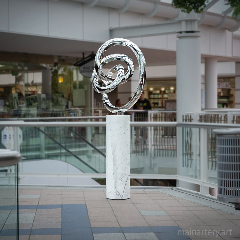 Cover: Infinity Twisted Stainless Sculpture