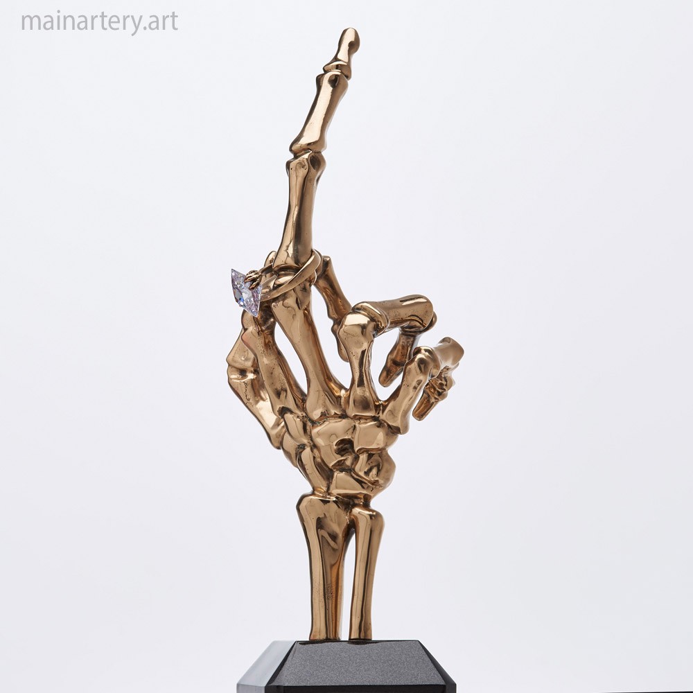 Cover: Memento Mori with Middle Finger Extended Sculpture