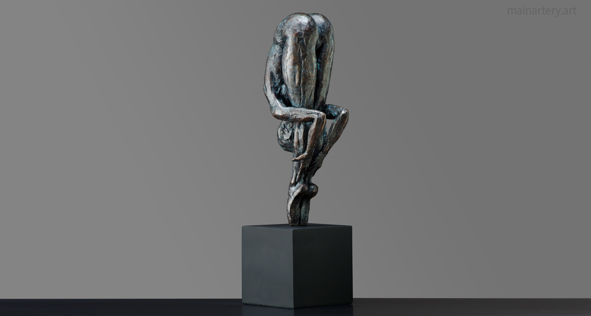 humility vertical totem balancing dancer mainartery sculpture image