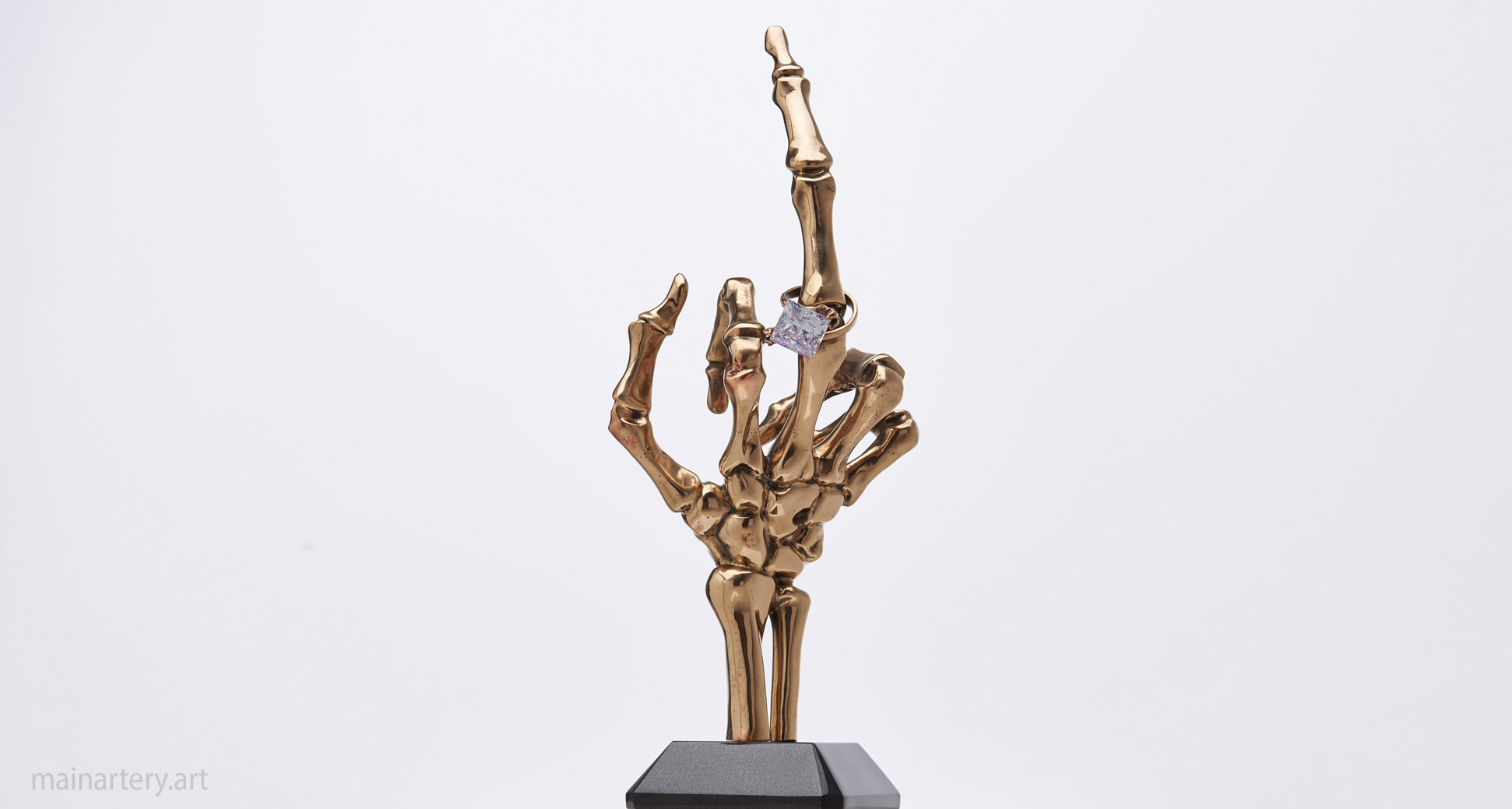 bronze figurative skeleton hand sculpture image