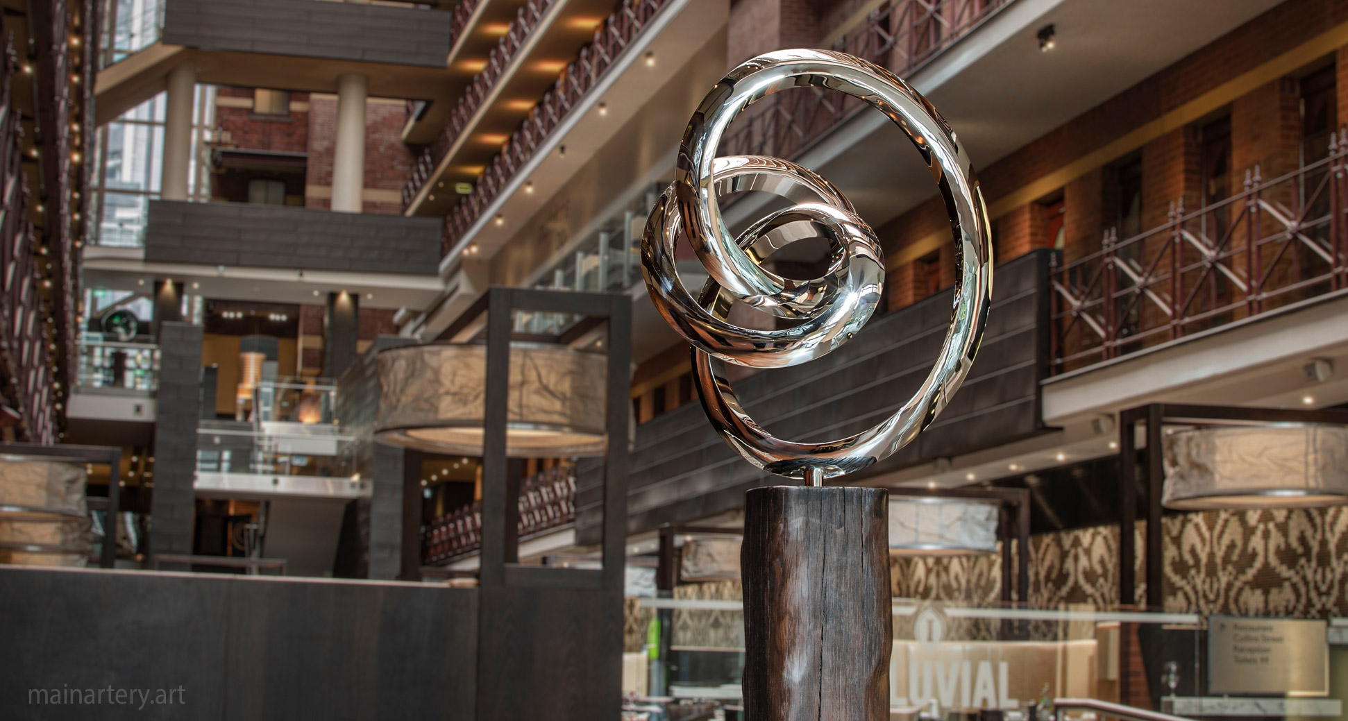 freestanding stainless modern interior sculpture image