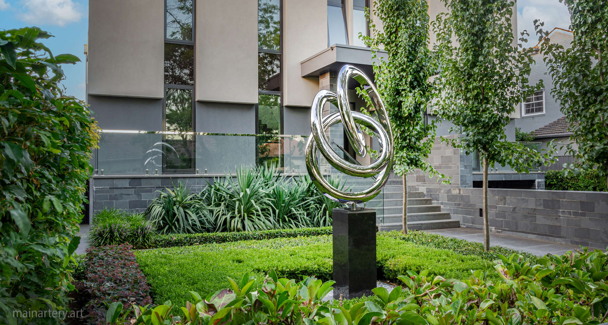 freestanding stainless modern outdoor sculpture image