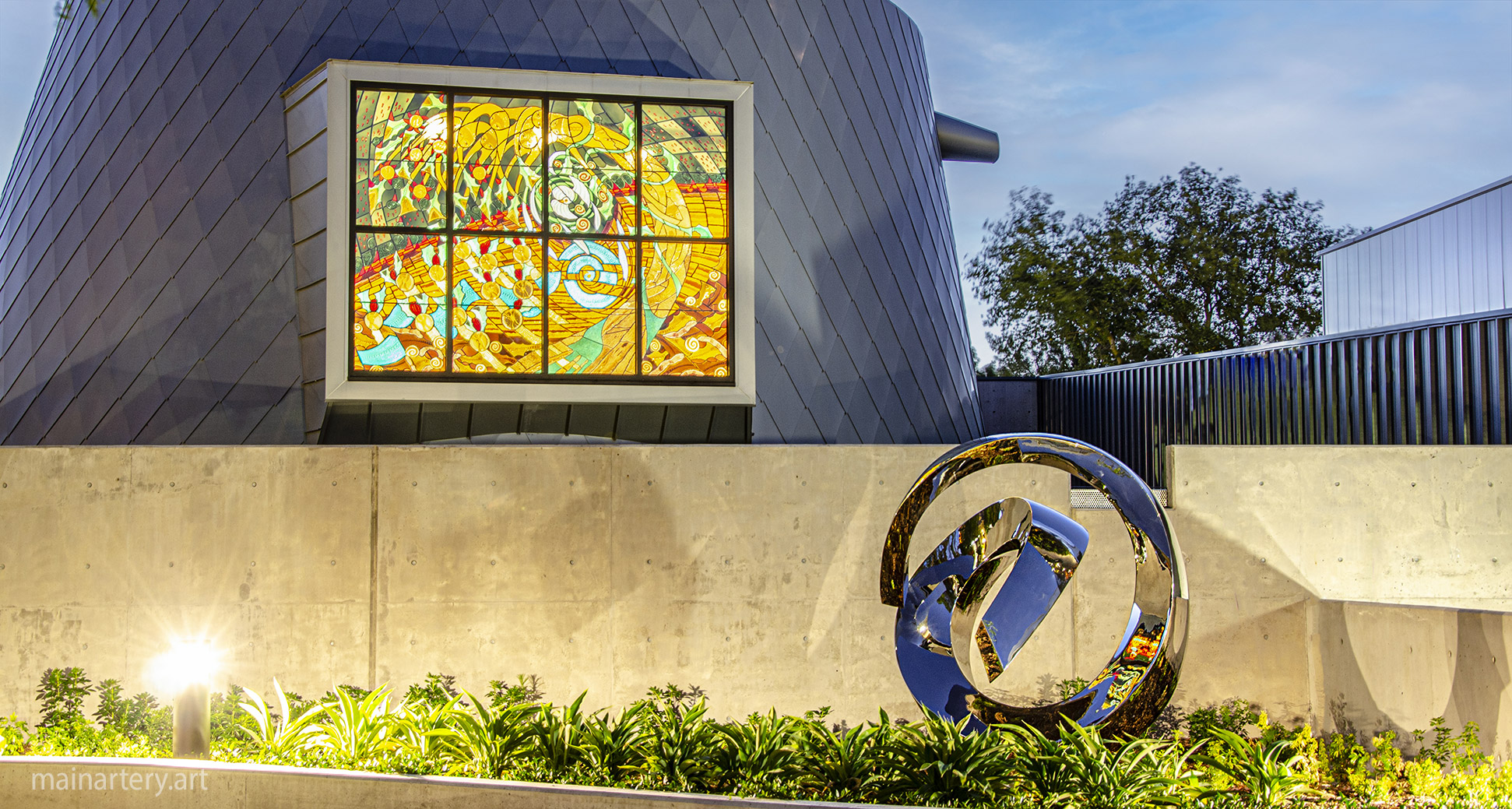 huge mirror polished representational landscape sculpture image