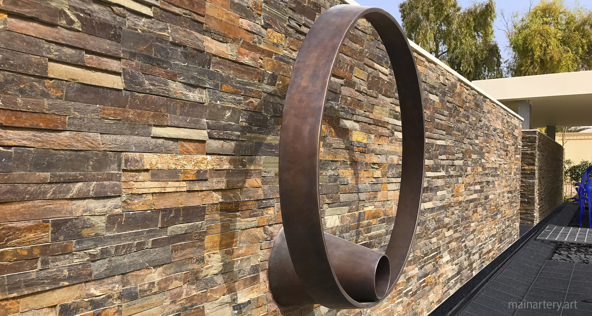 modern abstract outdoor wall mounted sculpture image