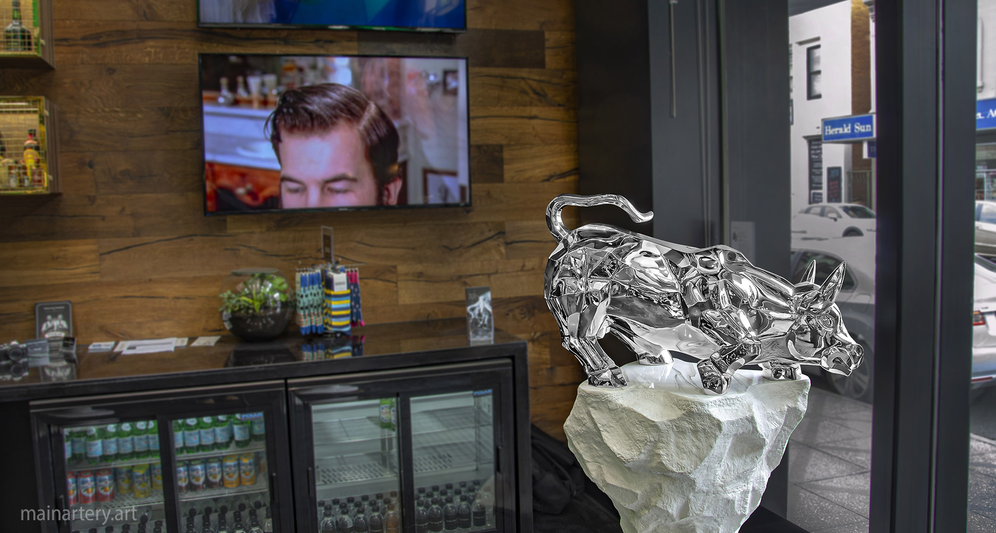 raging bull enterance sculpture rokkman barbers image