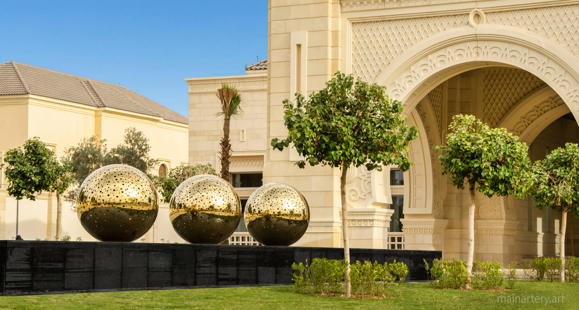 sheikhs palace huge gold titanium round sphere sculptures image