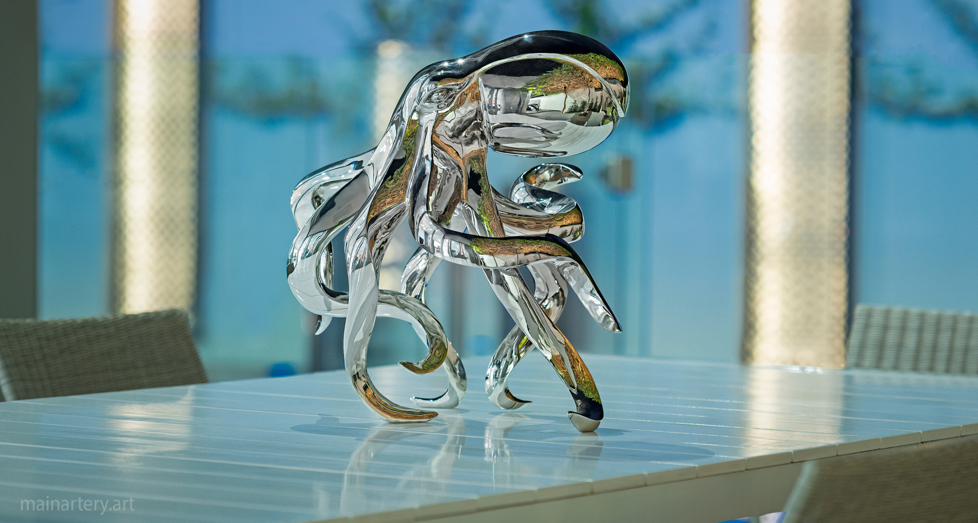 small mirror polished modern outdoor sculpture image