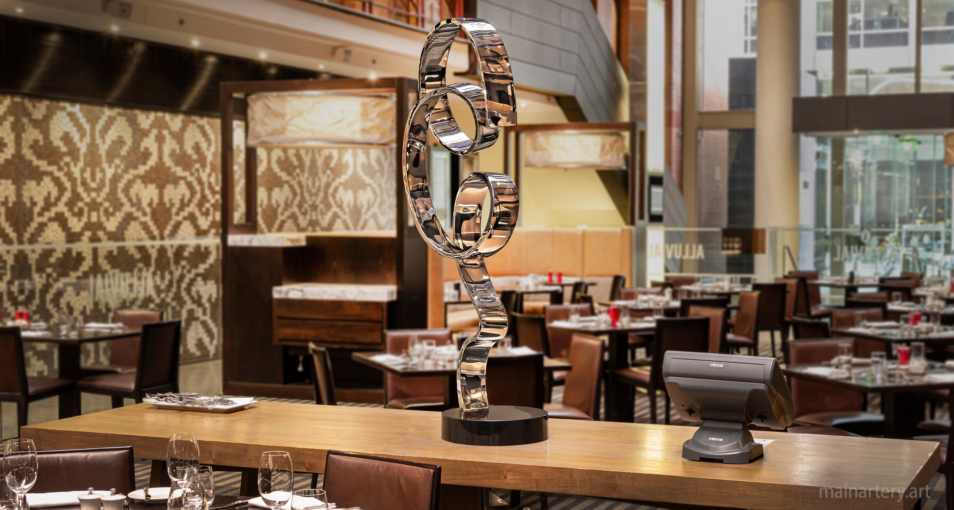 small stainless abstract feng shui sculpture image