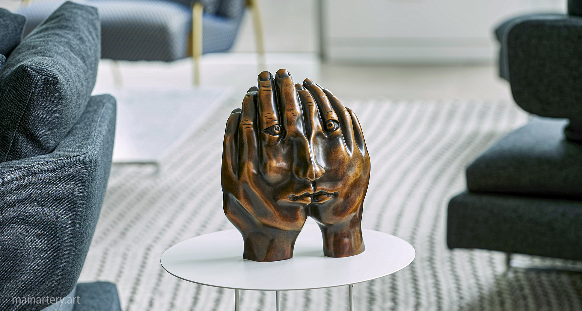 tabletop bronze hands interior sculpture image