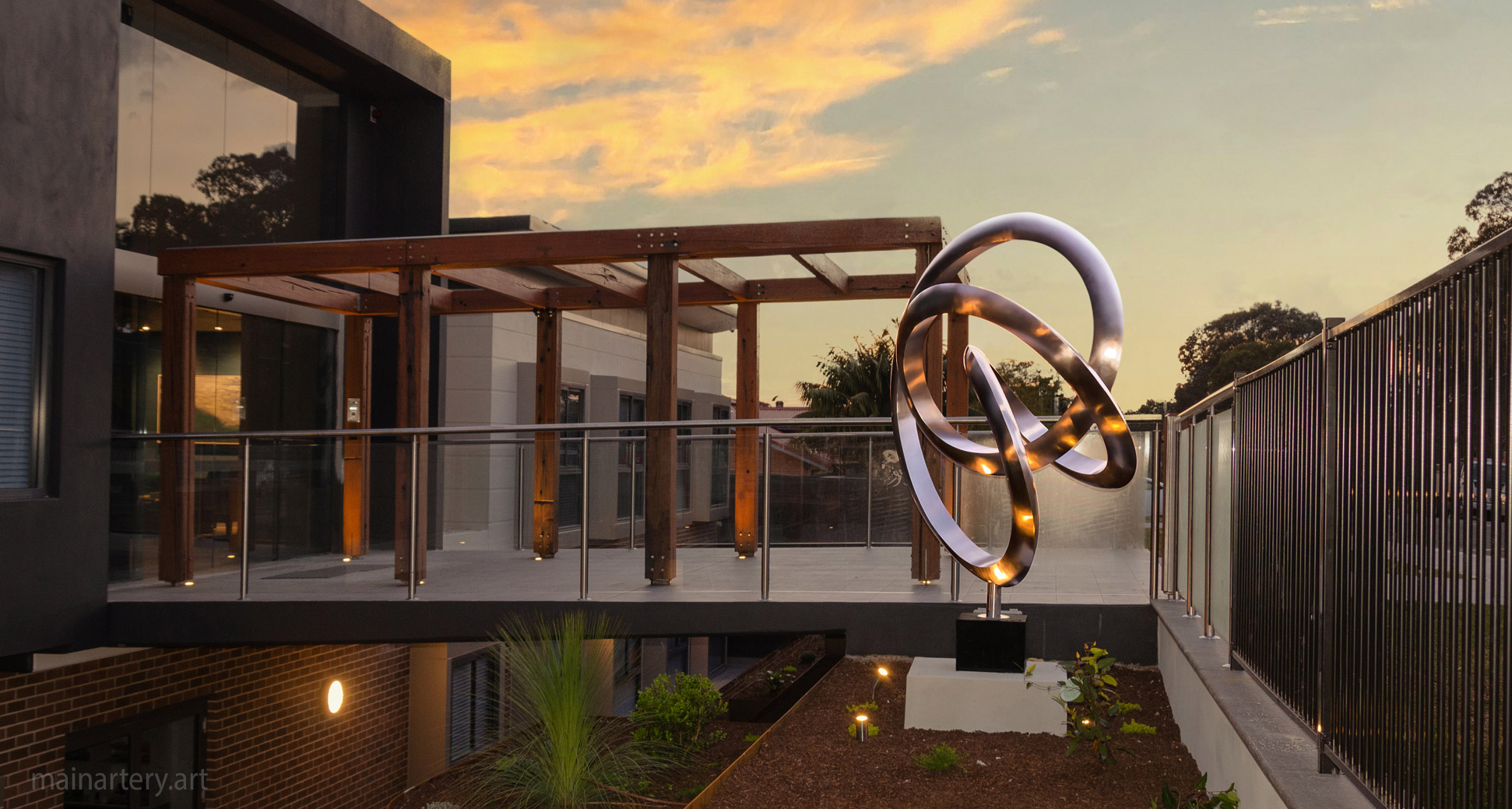 monumental contemporary building front sculpture image