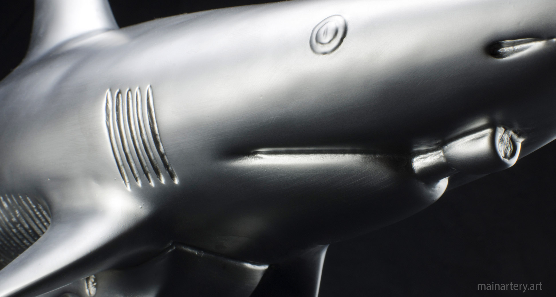 tabletop stainless modern tommy gun shark sculpture image