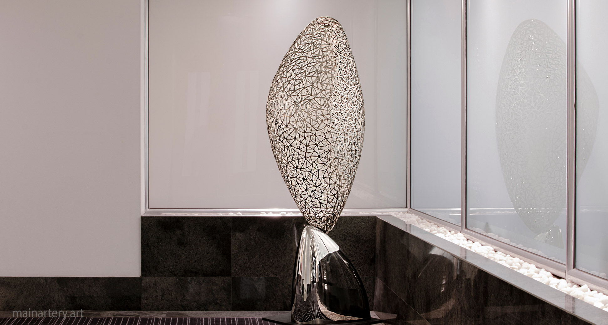 foyer sculpture stainless abstract commercial rental image