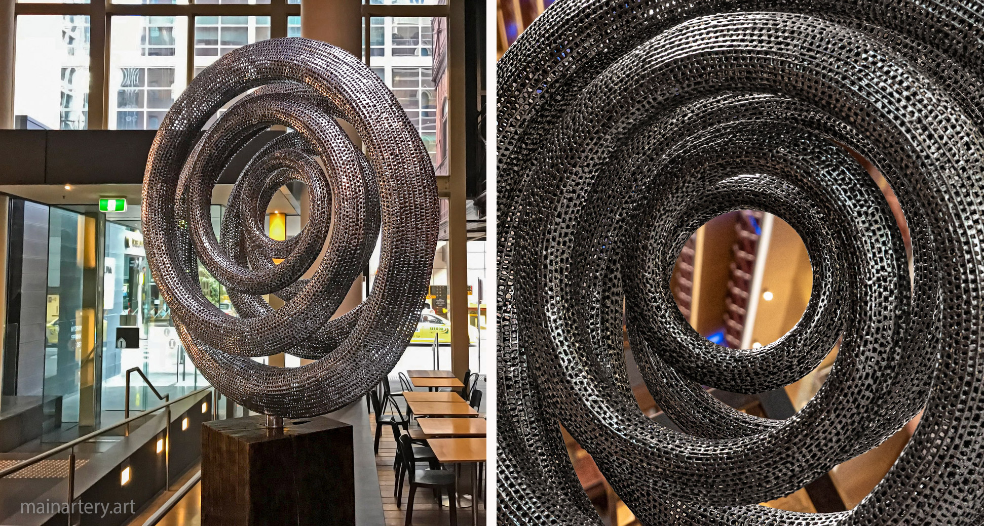 freestanding polished modern public art sculpture image