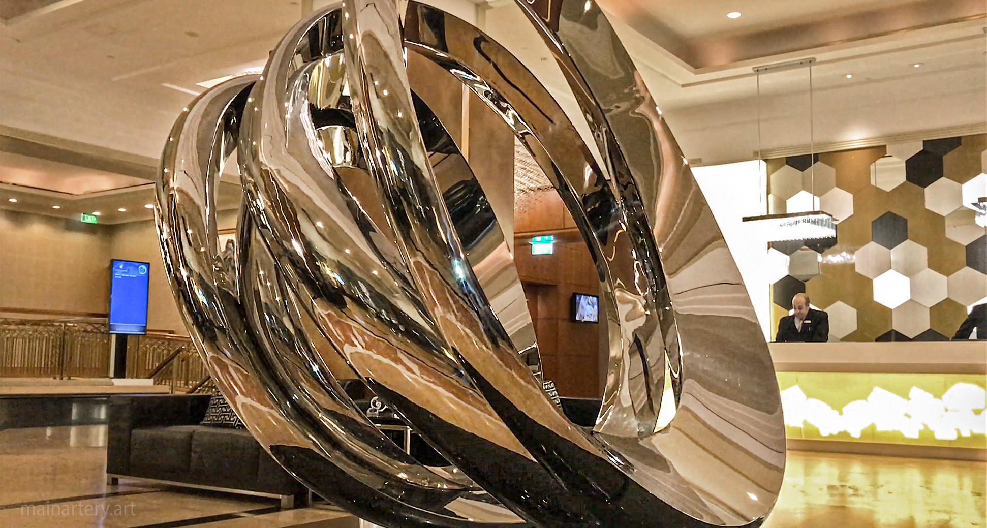 metal modern mortal coil lobby sculpture image