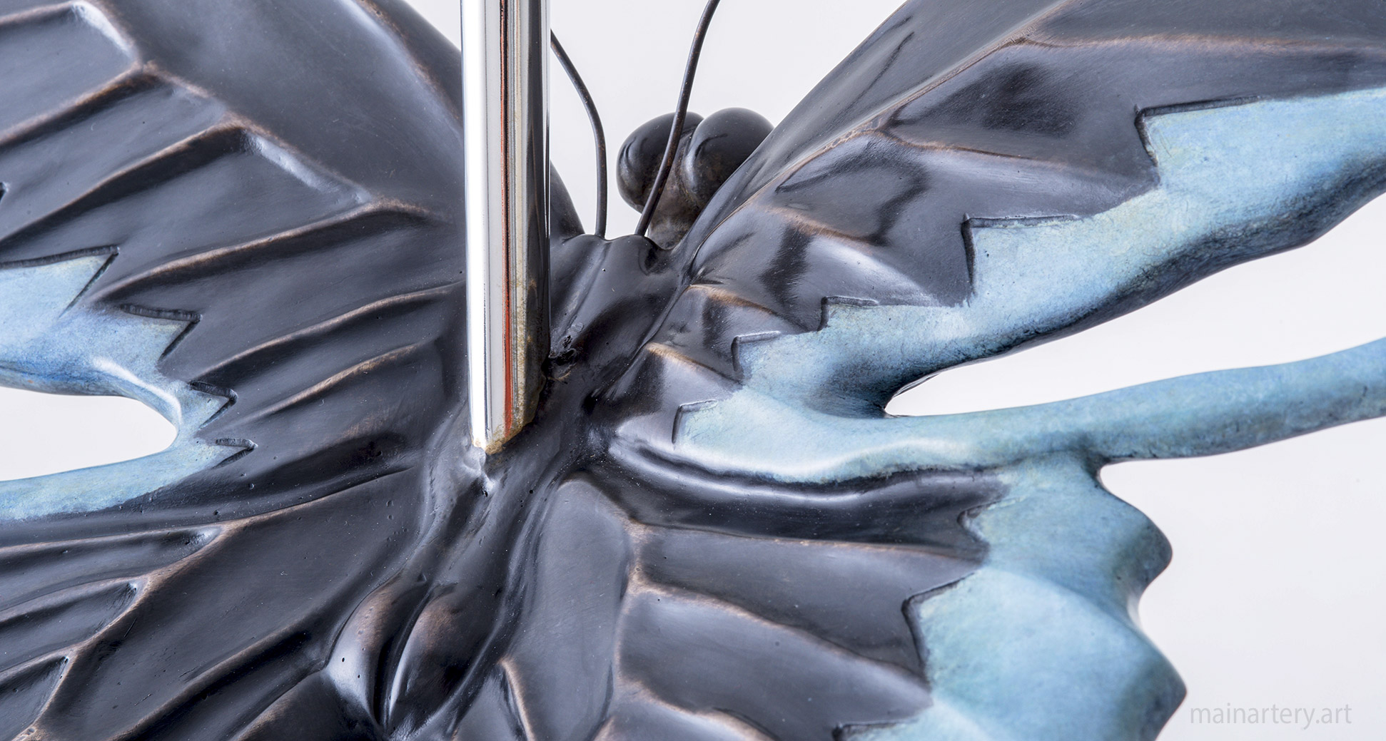 representational stainless steel butterfly artwork image