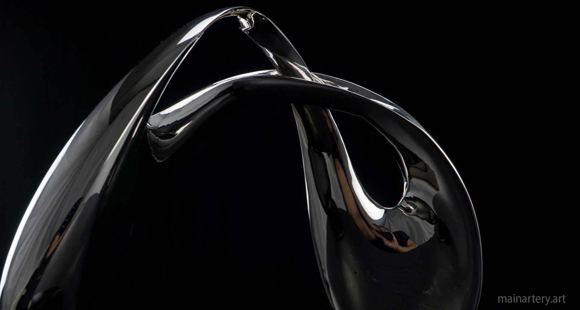 small mirror polished infinity artwork image