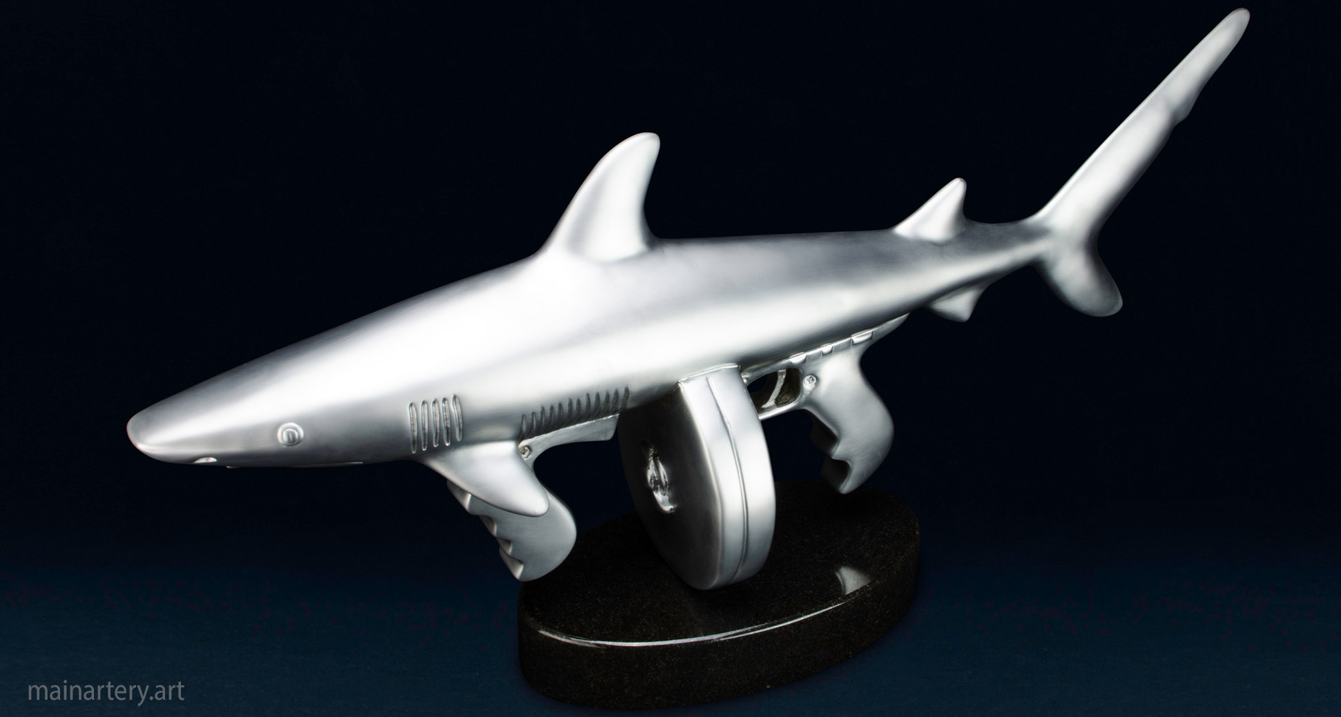 interior tommy gun shark sculpture image