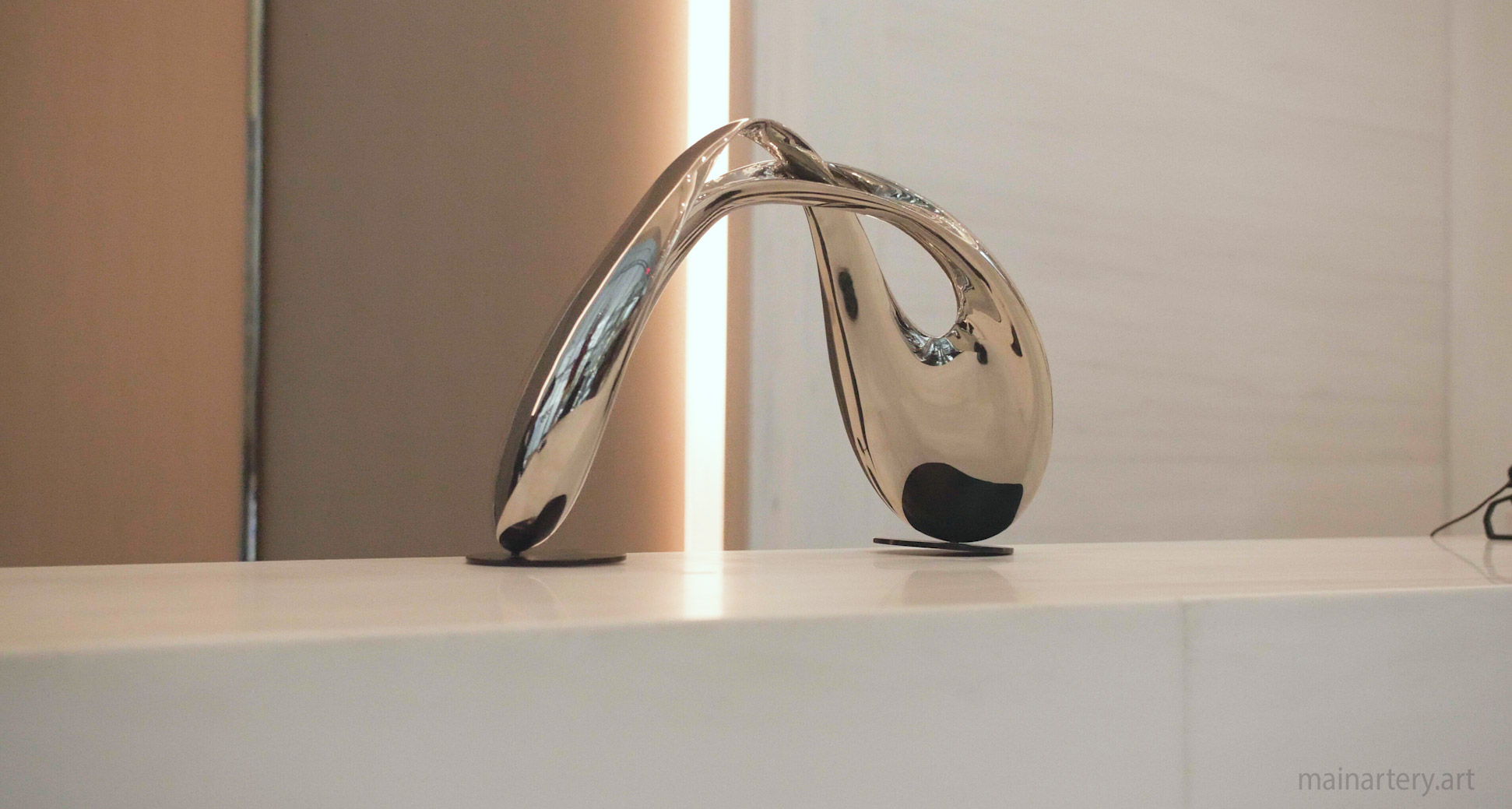 tabletop stainless steel organic forms art image