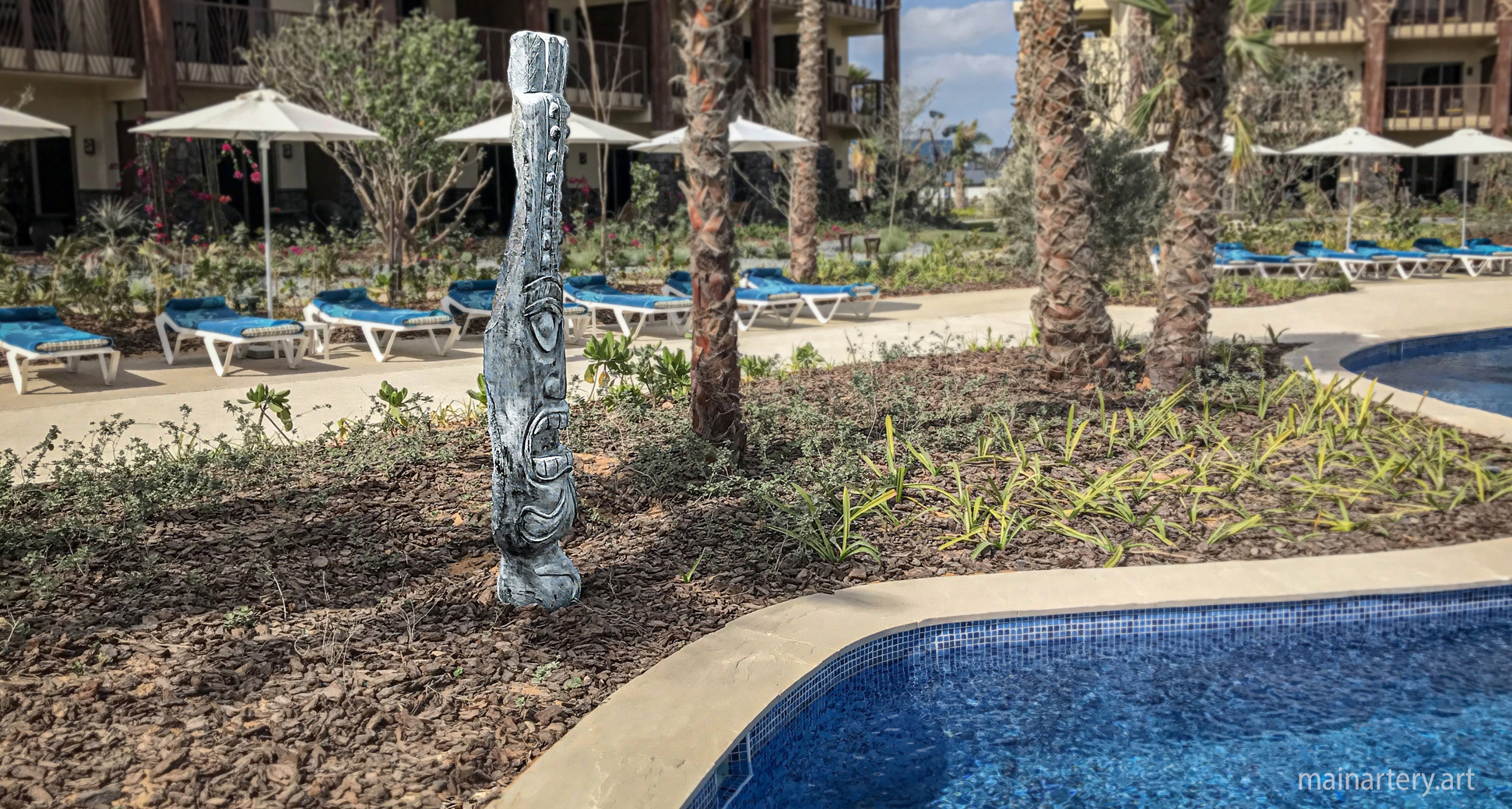 hand carved stone figurative totem sculpture image