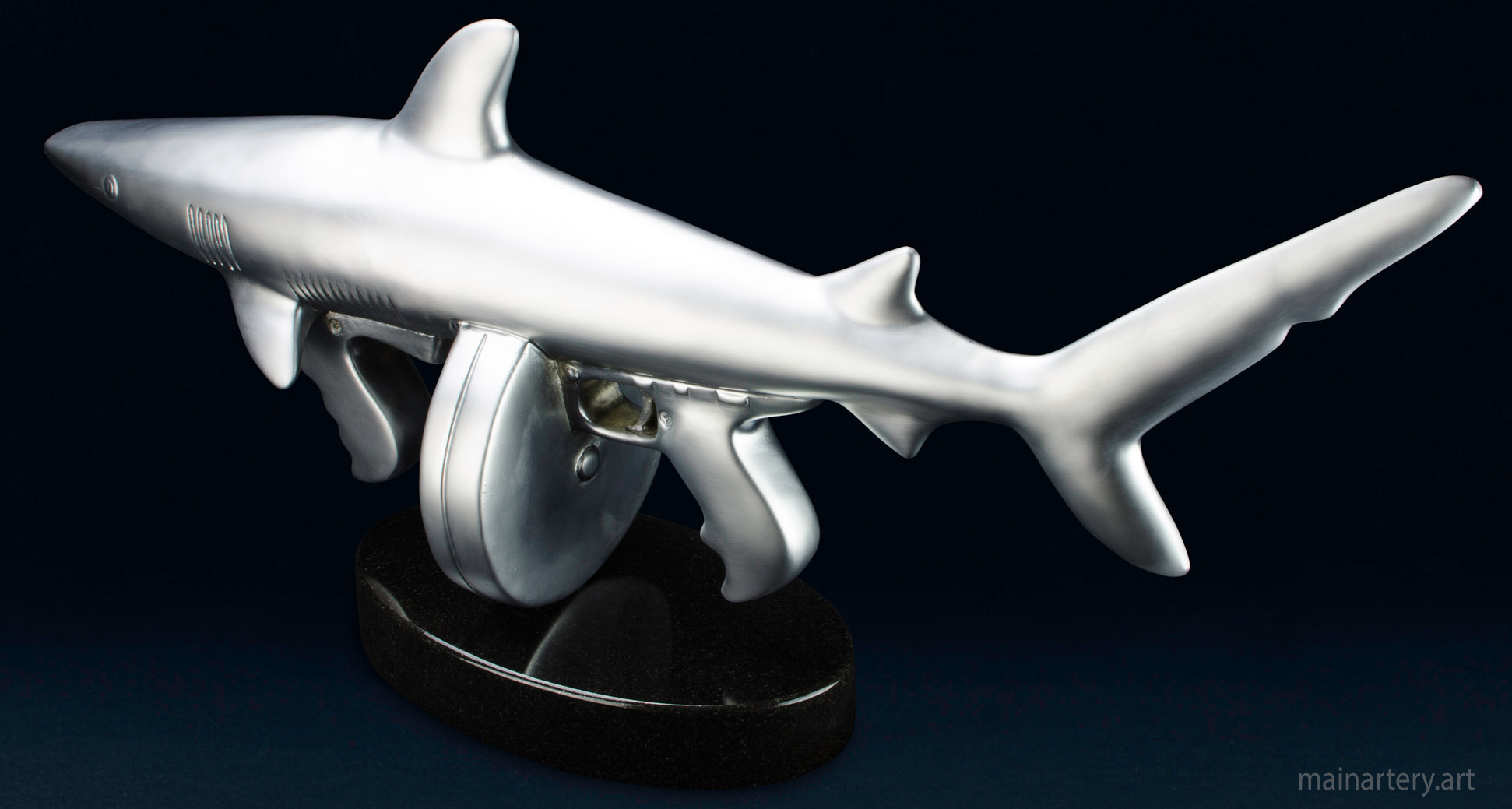 small metal from natures hand shark sculpture image