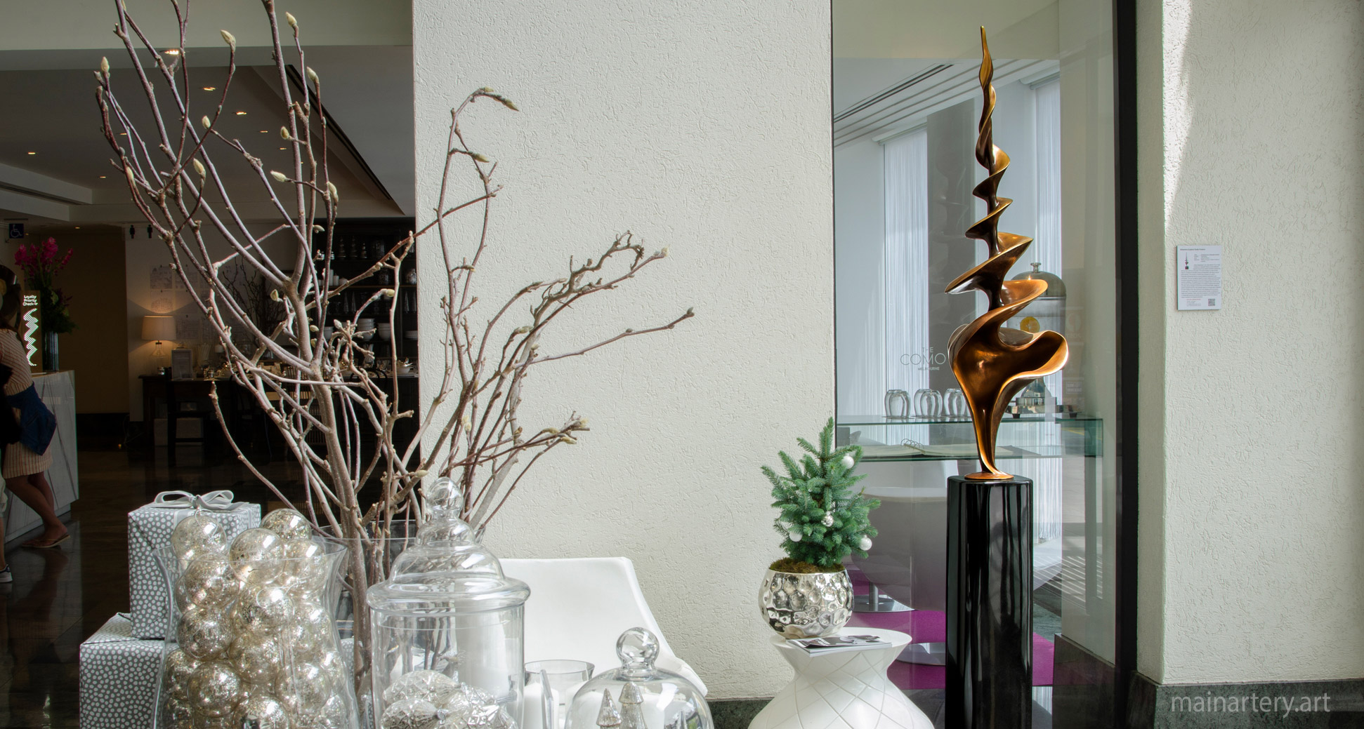 freestanding entrance bronze patina representational shell artwork image