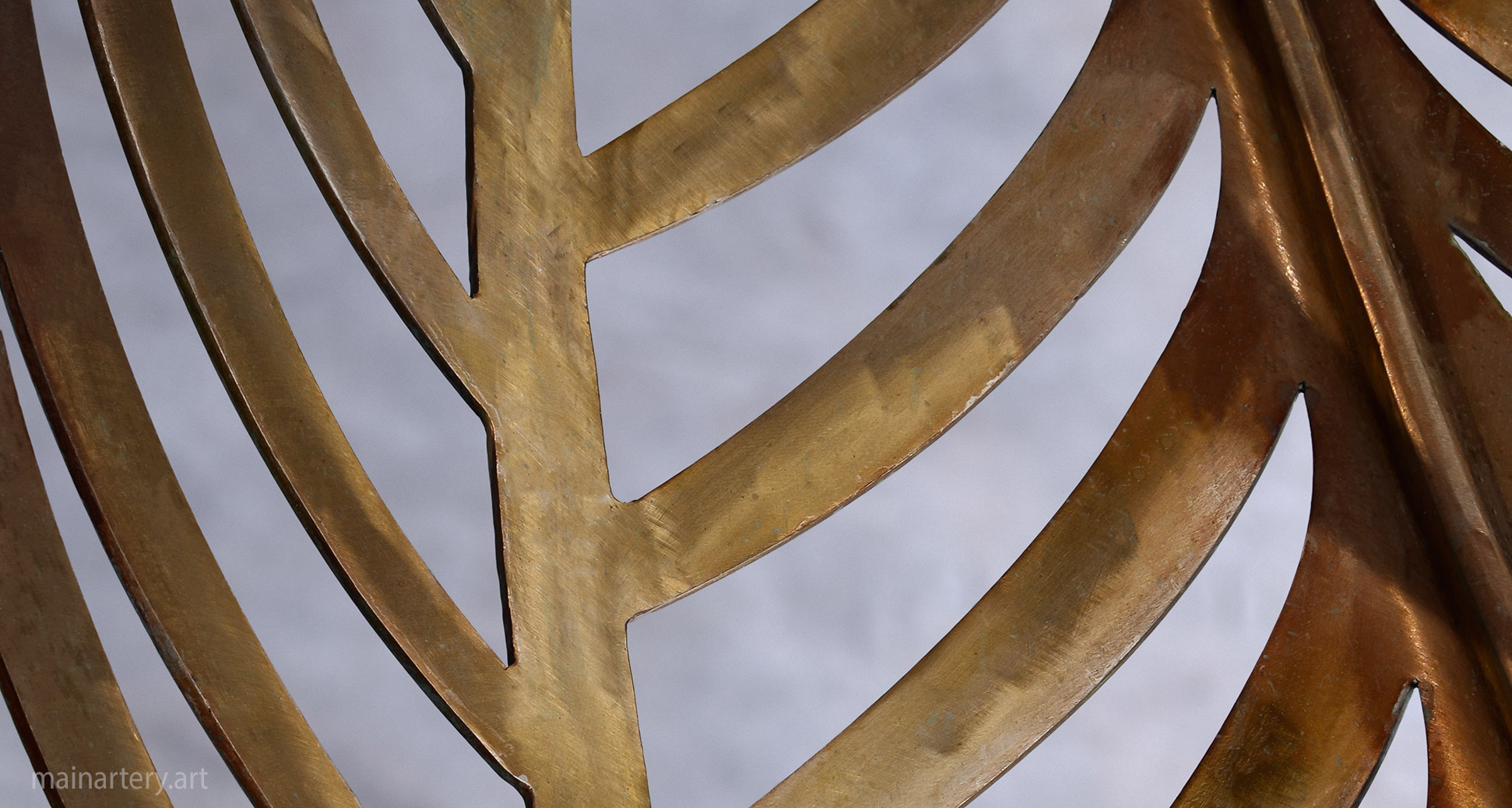 freestanding patina spiral motif outdoor sculpture image