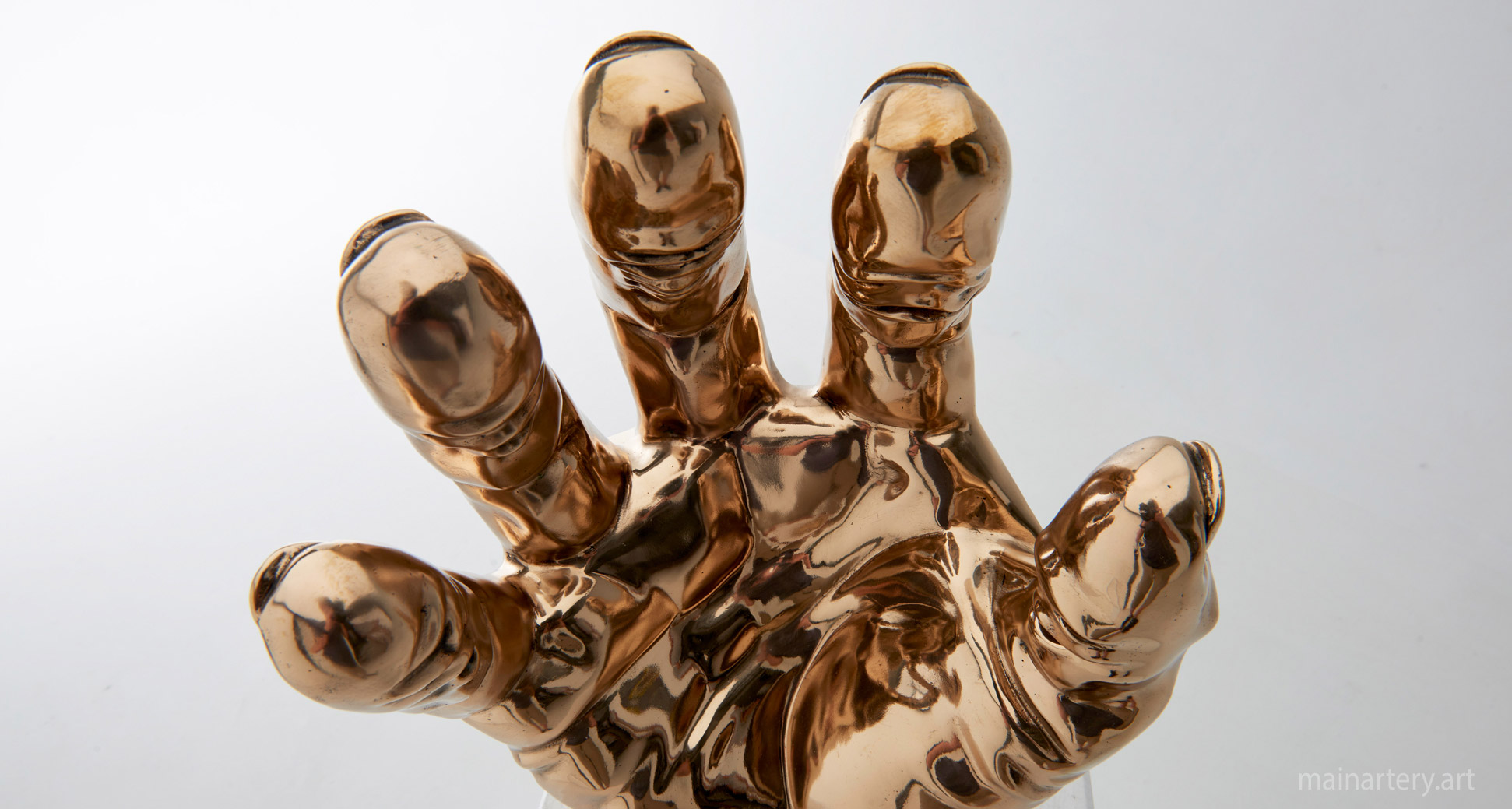 tabletop polished bronze contemporary hand sculpture image