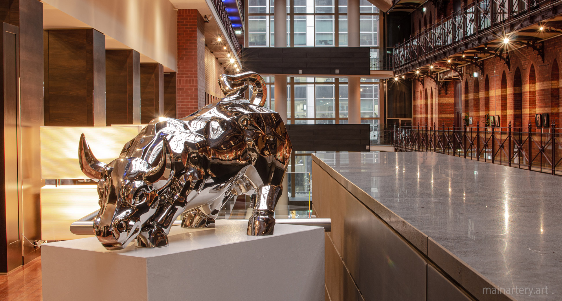 large stainless steel bull lobby sculpture image