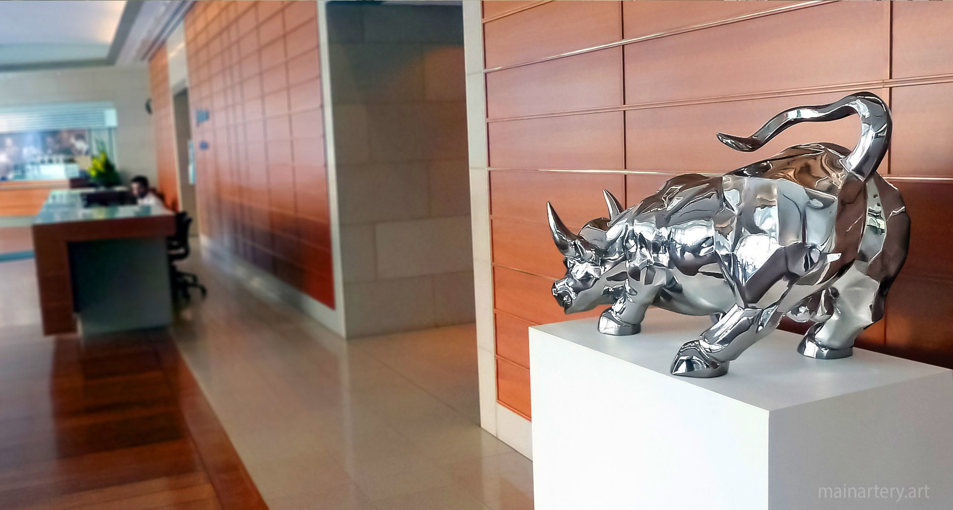 hotel desk polished raging bull sculpture image