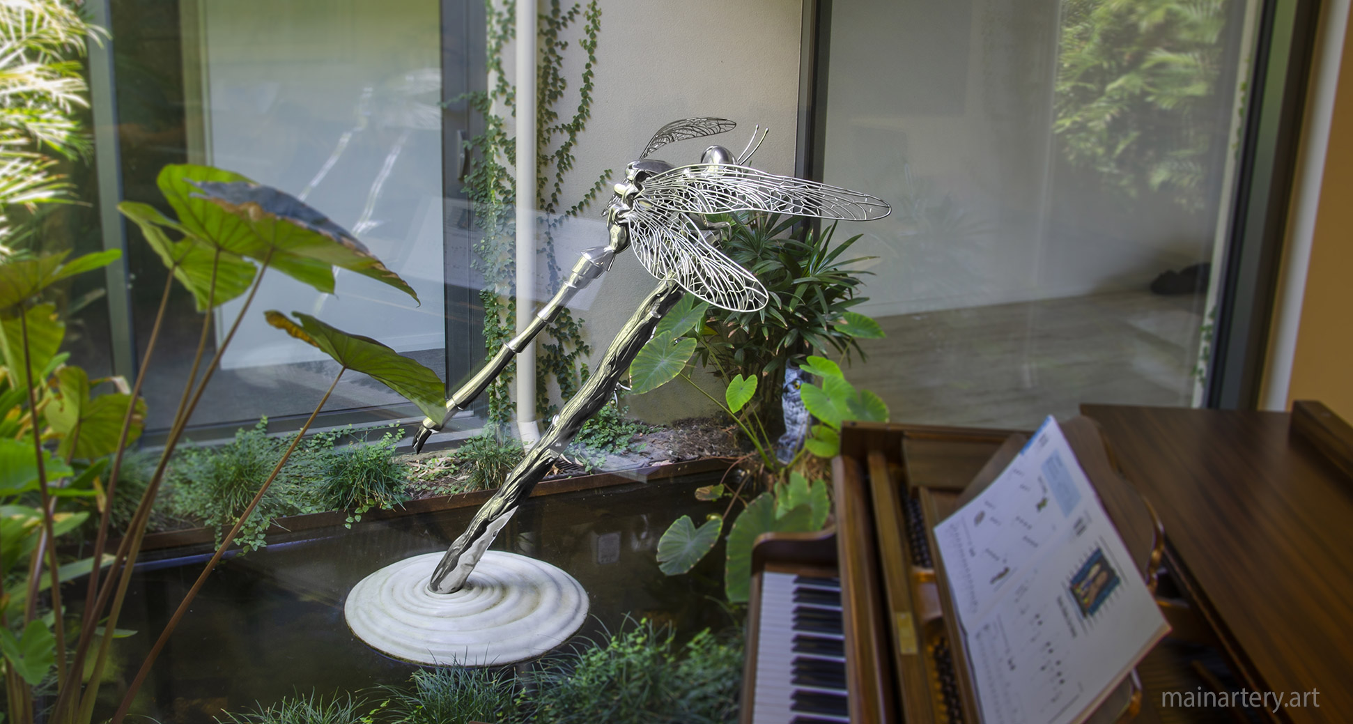 freestanding stainless steel modern dragonfly art image