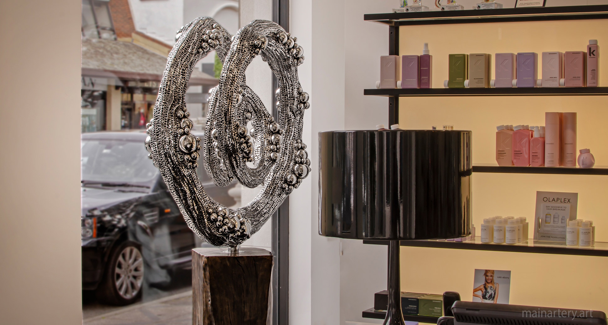 interior stainless abstract shop front sculpture image