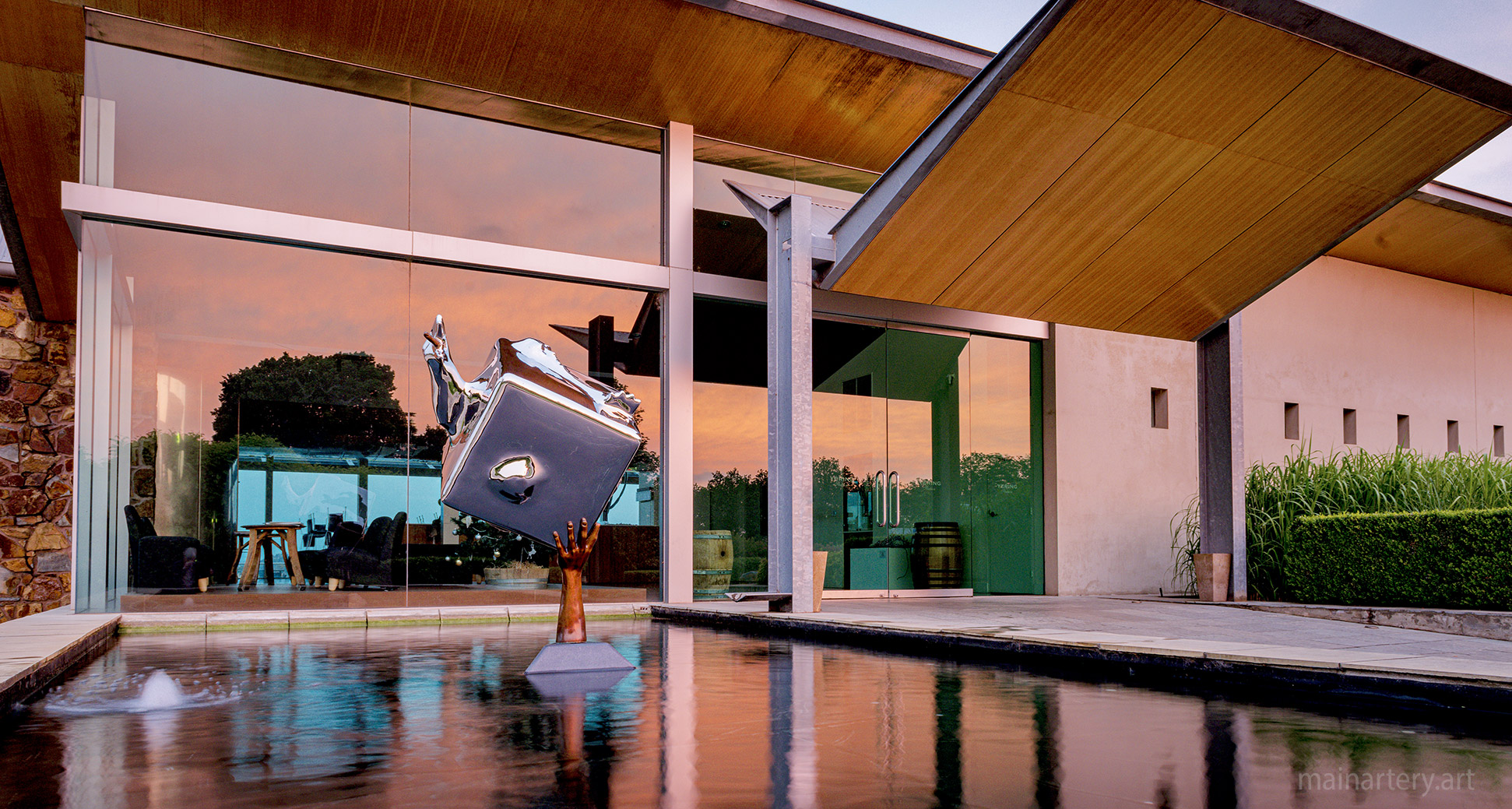 large mirror polished organic garden sculpture image