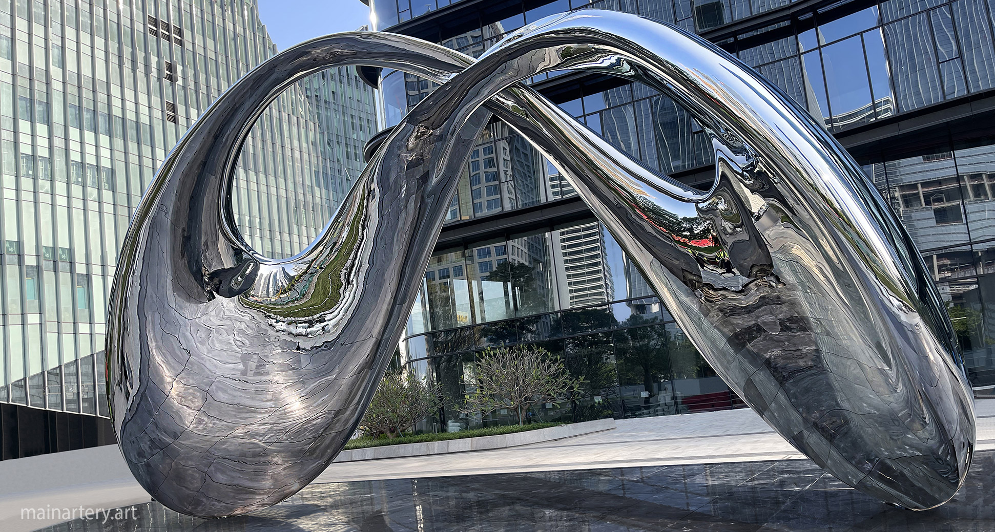 monumental stainless steel infinity symbol sculpture art image