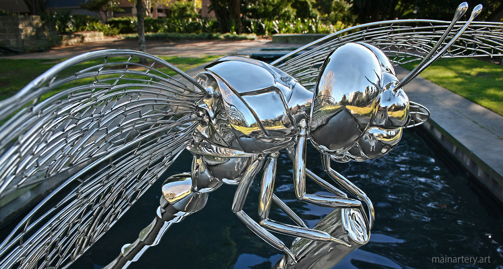 realistic dragonfly art polished metal image