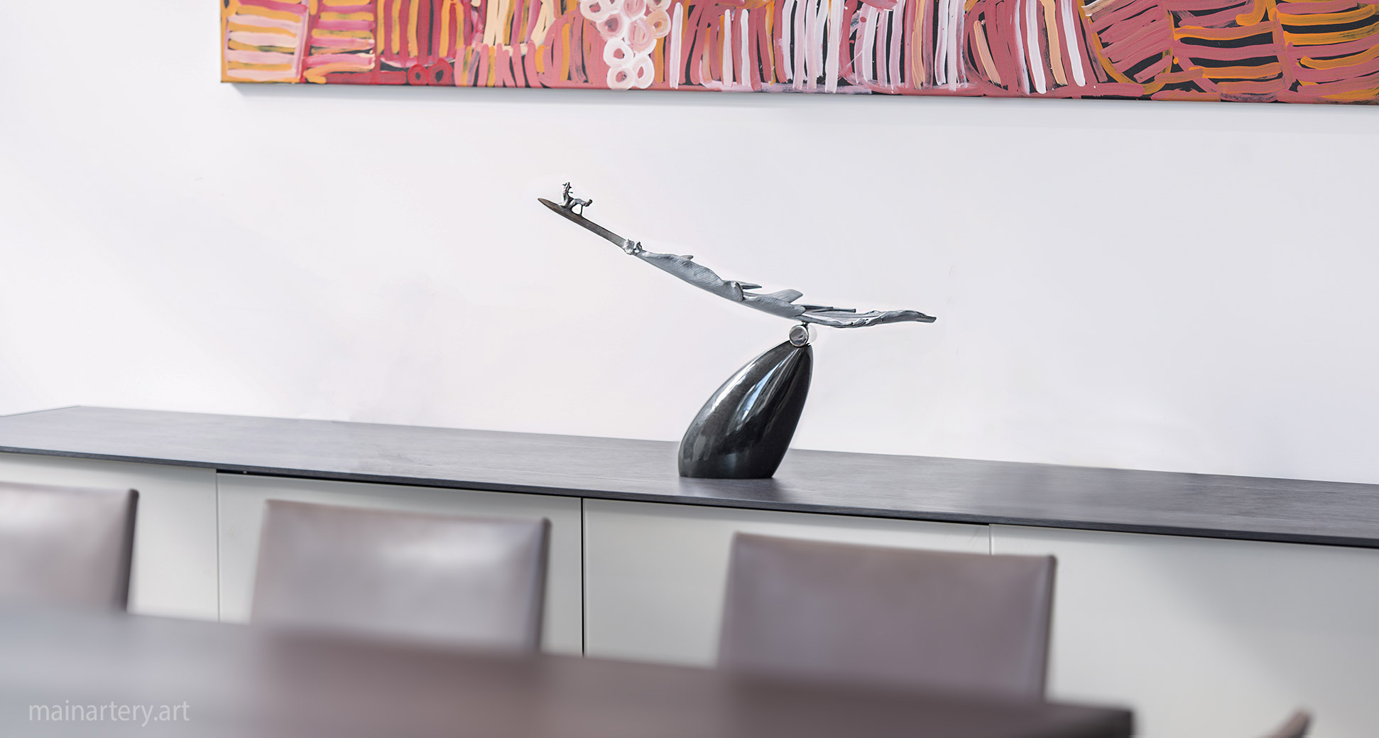 small tabletop figurative stability feather artwork image