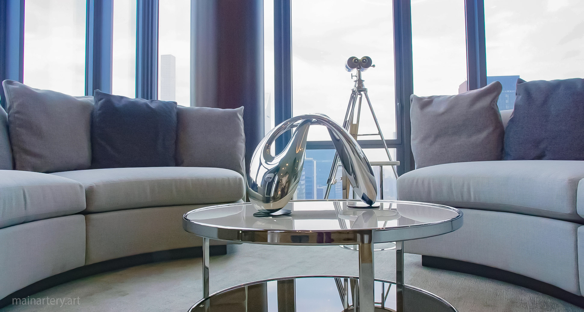 tabletop stainless steel abstract infinity sculpture image