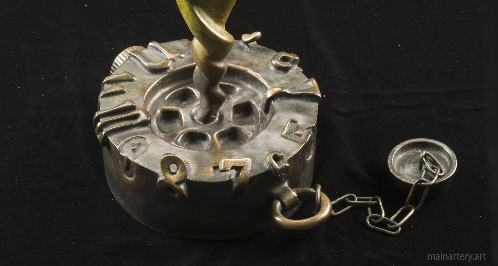 bronze multi patina drain sculpture image