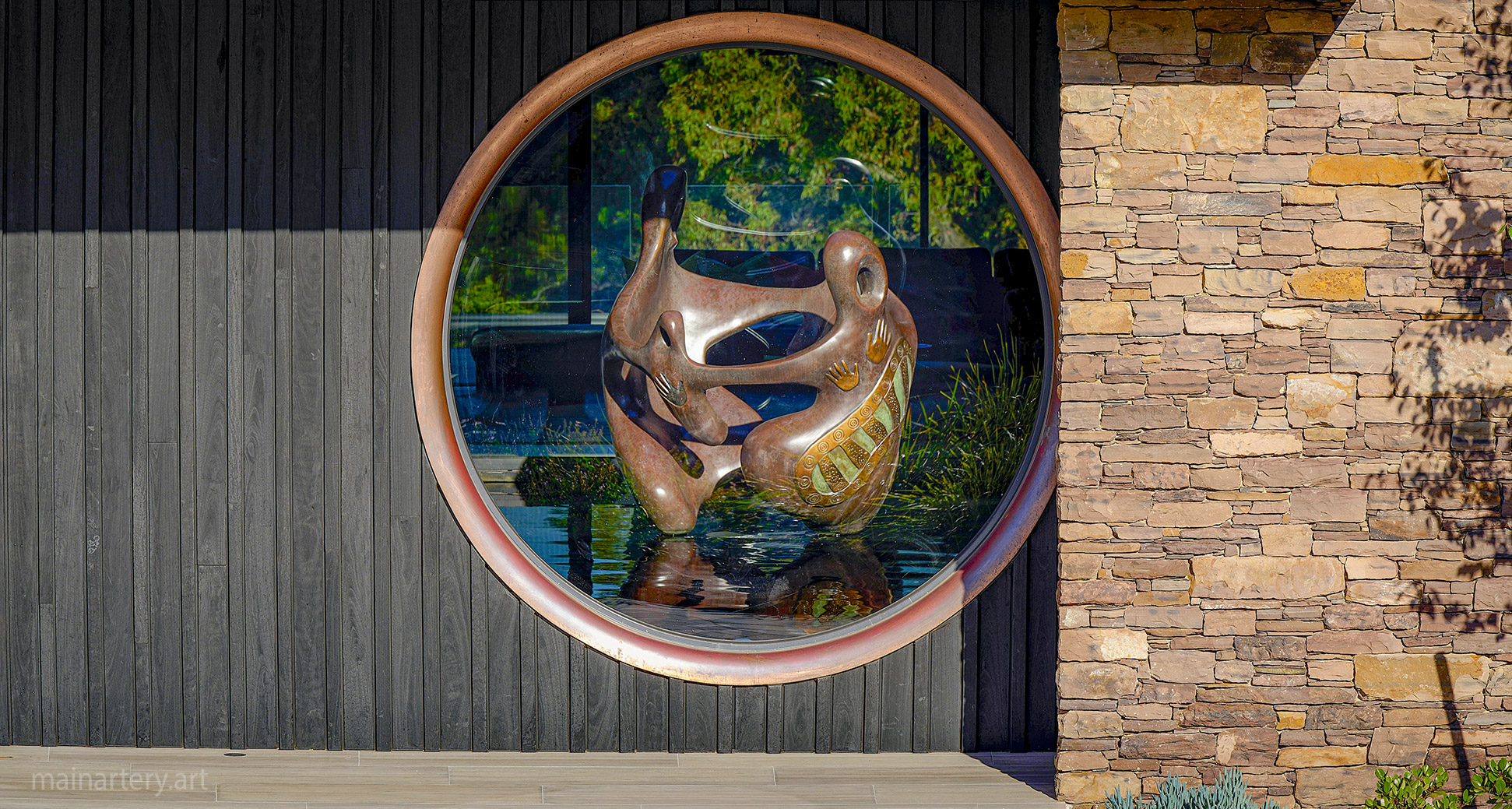 Large Patina Representational Family Dance Sculpture, celebrating unity and tradition