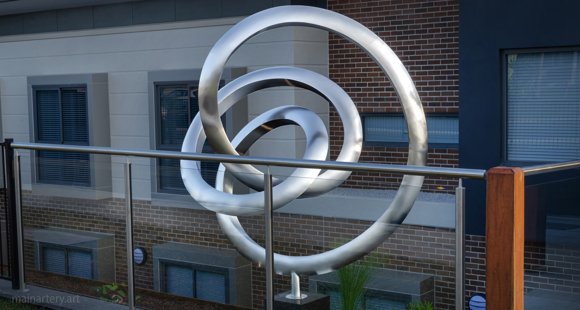 large stainless modern landscape sculpture image