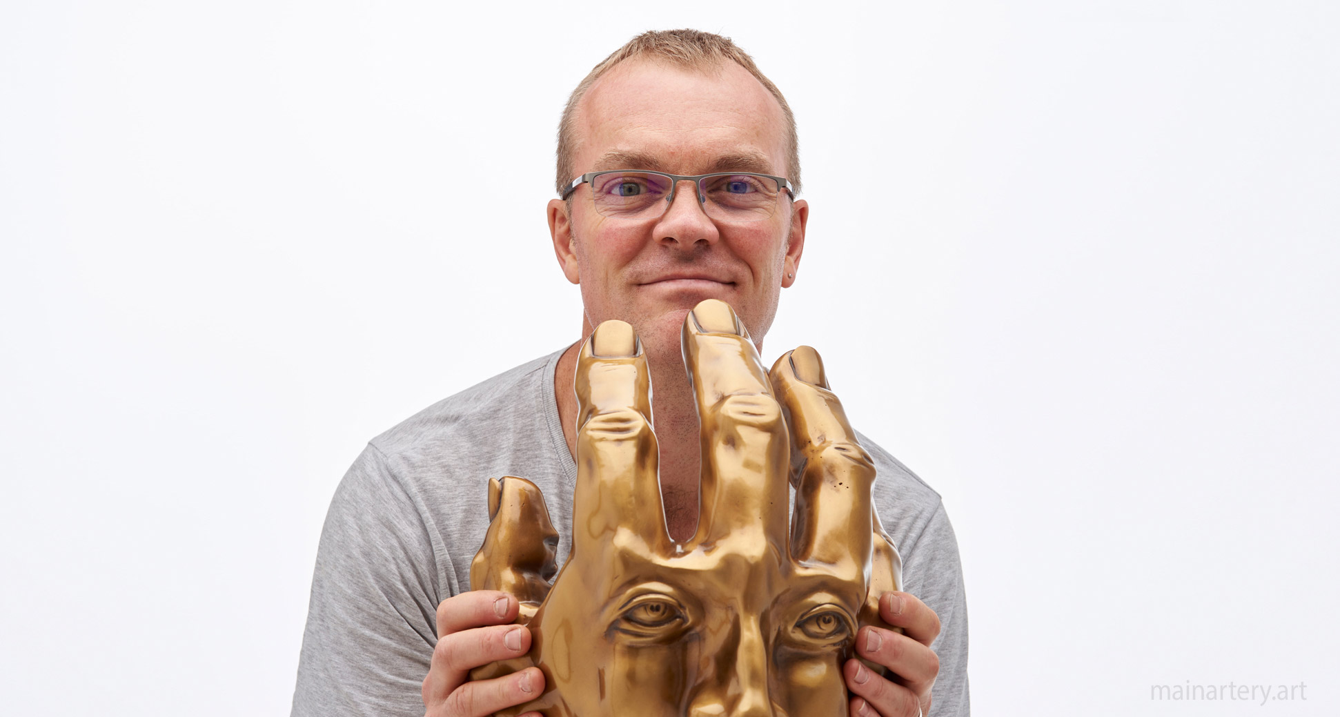 sculpture of the artist as a hand image