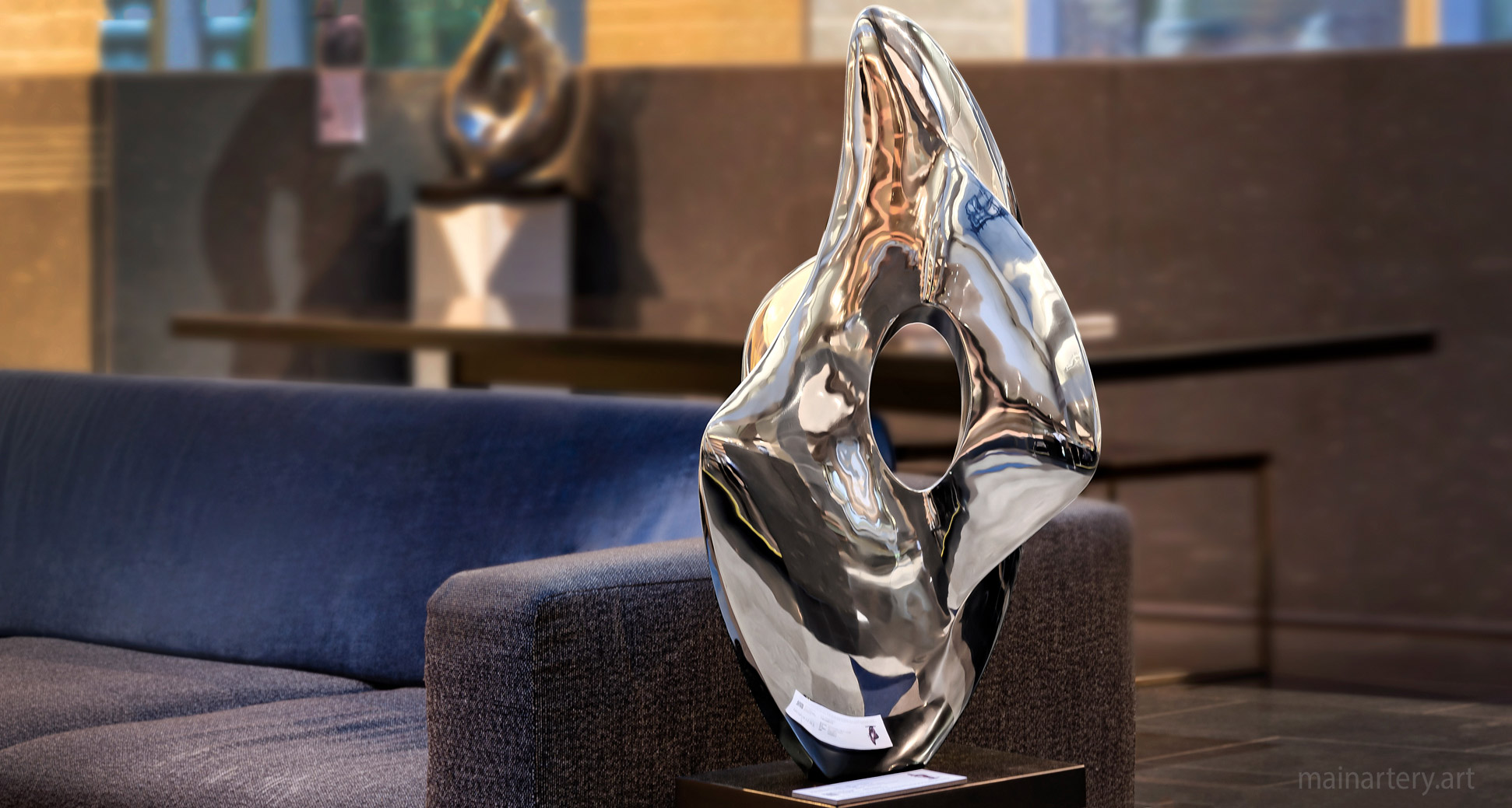 freestanding mirror polished organic sculpture image