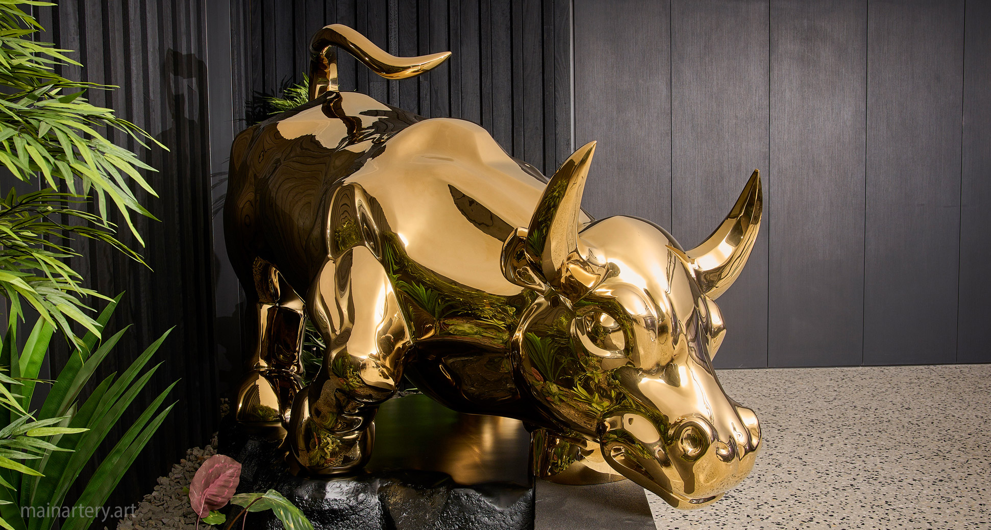 large polished titanium raging bull interior art image