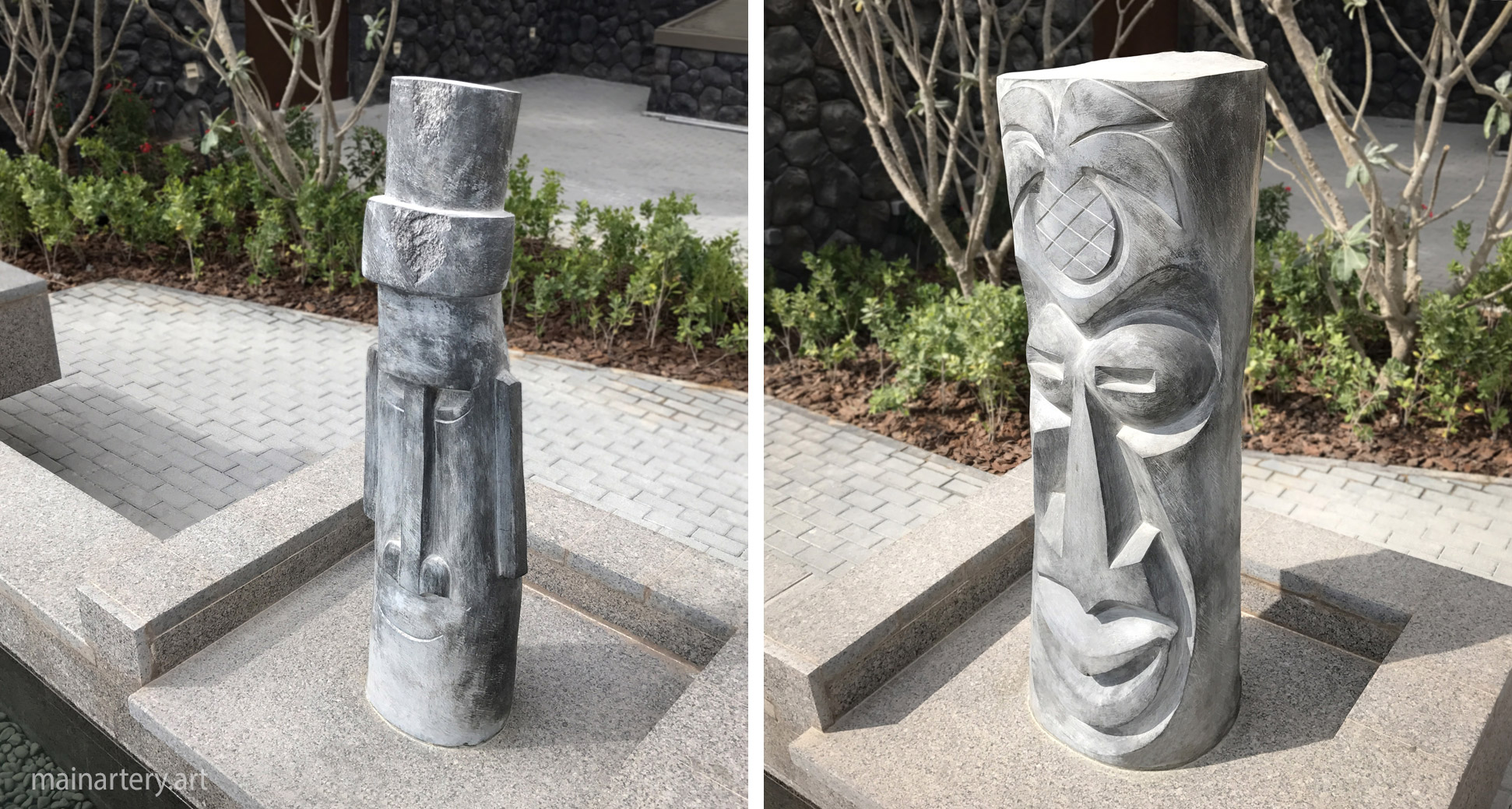 outdoor stone representational totem sculpture image