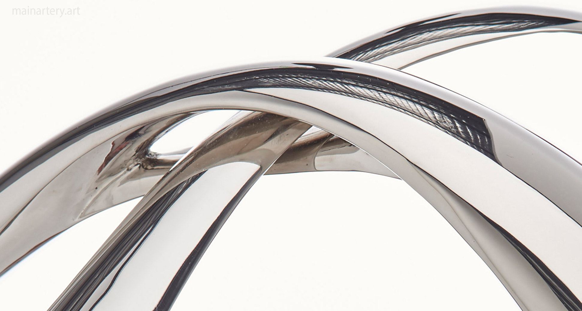 stainless steel infinity sculpture loop image