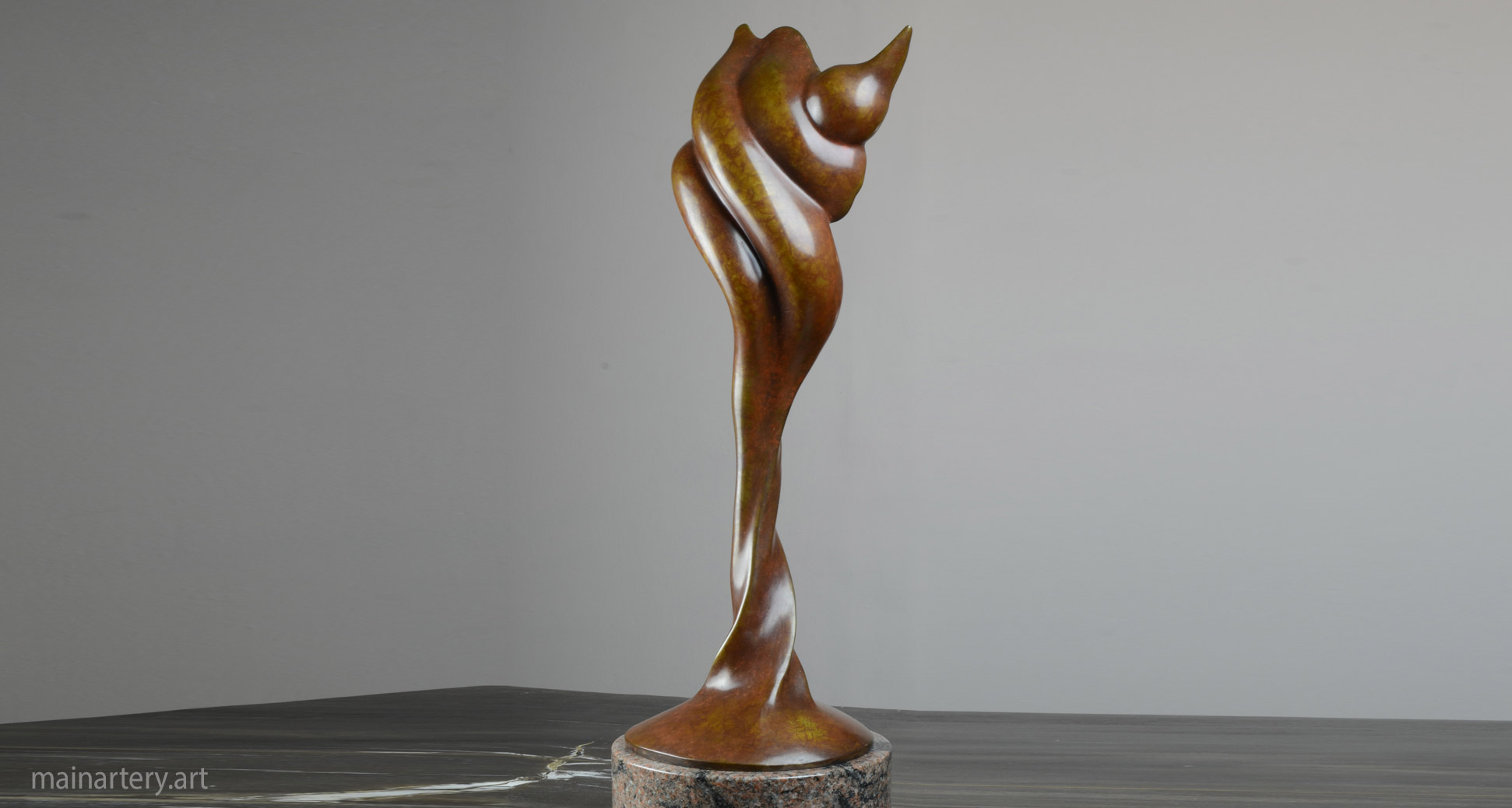 bronze organic morhping shell sculpture image