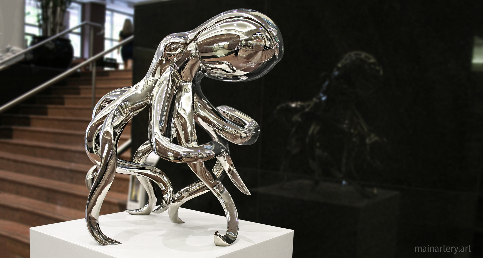 foyer mirror polished contemporary octopus sculpture image