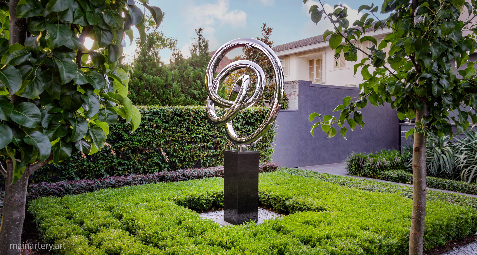 front yard stainless steel double tied sculpture image